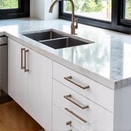 Custom kitchen cabinetry installation in Timberwood Park. This photo highlights bespoke wooden cabinets, integrated appliances, and smart storage solutions for a streamlined look.
