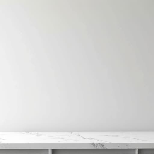 Modern kitchen with pristine white quartz countertops, stainless steel appliances, and sleek design